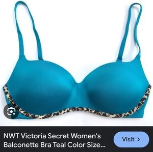 Victoria's Secret Knockout balconette bra in a teal color with a leopard accent
